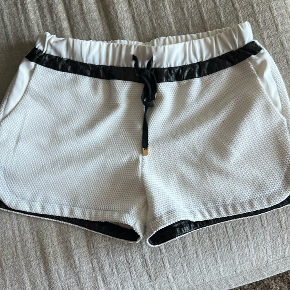 White and black shorts, faux leather trim
